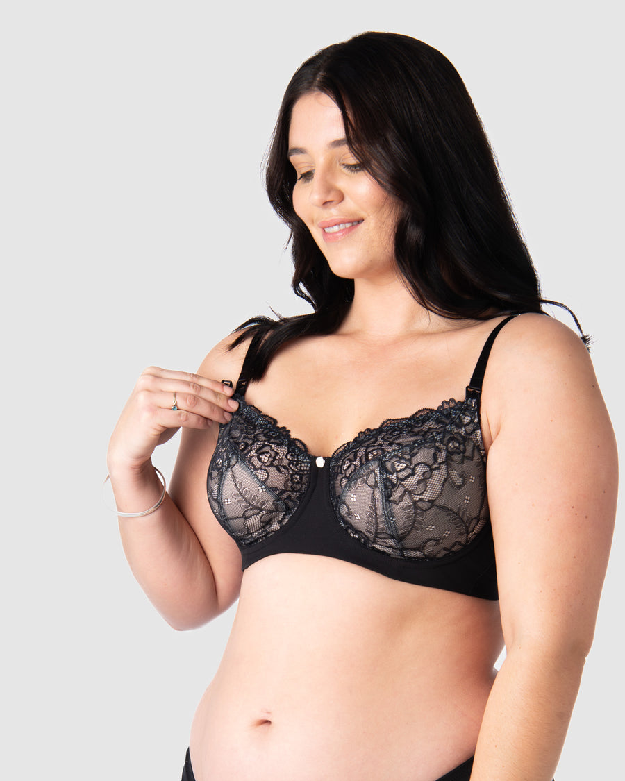 Olivia showcases the nursing clip functionality on Hotmilk UK award-winning Temptation in Black. Meticulously crafted for larger cup sizes, this bra provides a blend of style, support, and comfort throughout your breastfeeding journey