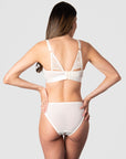 Transforming beyond the ordinary, the stunning back shoulder details elevate the Hotmilk Lingerie Warrior Soft Cup nursing bra into a stylish must-have on your breastfeeding journey. With 6 rows of eye and hooks, it offers the flexibility needed during pregnancy and postpartum. Experience the ultimate comfort and support without compromising the woman in you with this exceptional piece from Hotmilk Lingerie. Elevate your nursing journey with unparalleled style and functionality