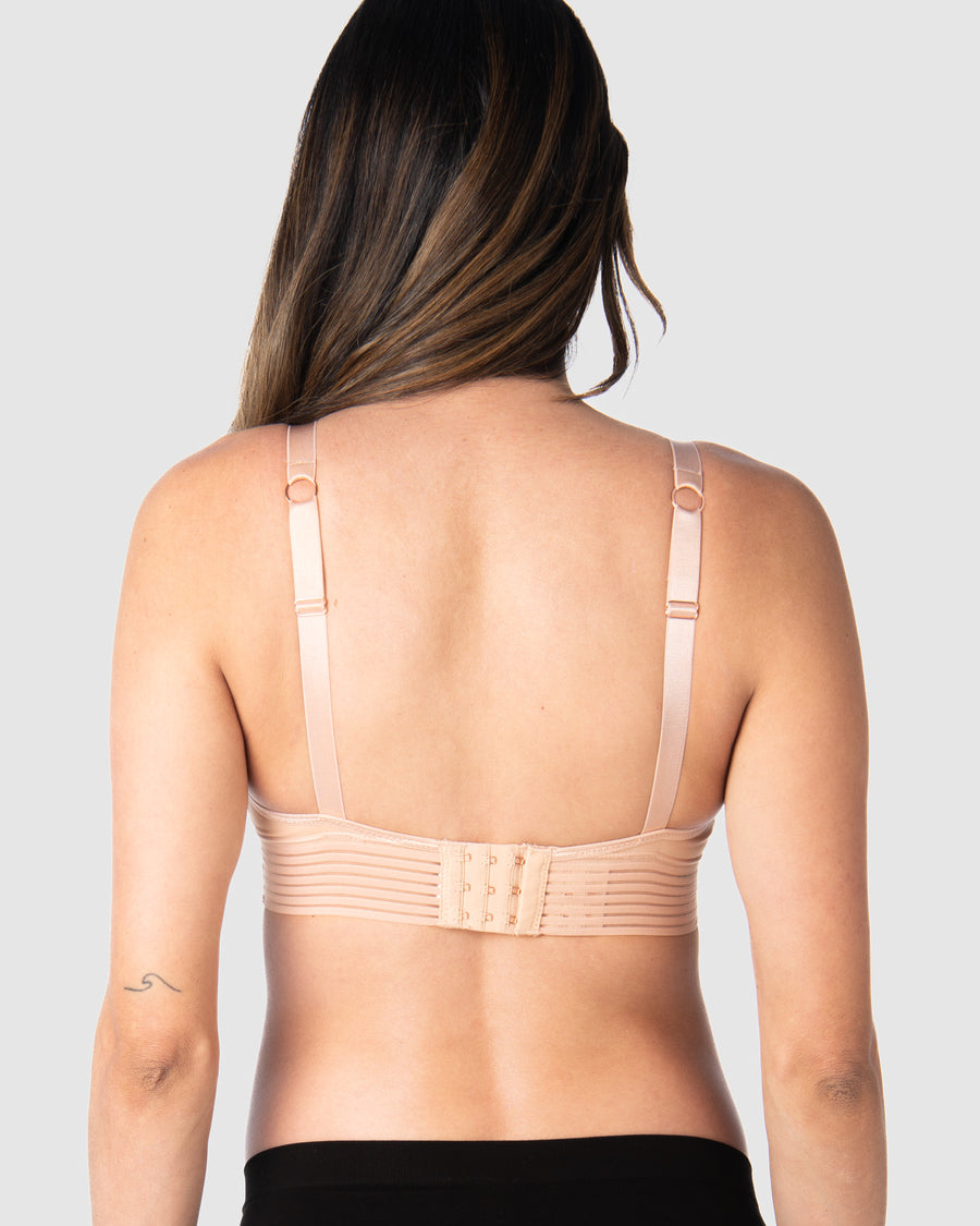 Kami, expecting mother of 2, demonstrating the versatile standard or convertible racerback feature of Hotmilk UK's Ambition T-Shirt Wirefree nursing and maternity bra in shell pink, designed for maternity, nursing, and breastfeeding comfort