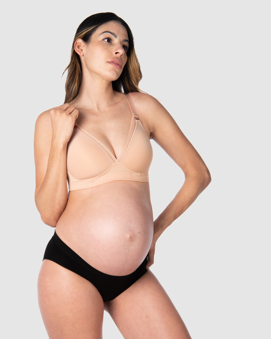 Kami, pregnant mother of 2, showcasing the full-body view of Hotmilk Uk's Ambition T-Shirt Wirefree nursing and maternity bra in shell, thoughtfully crafted for maternity, nursing, and breastfeeding comfort