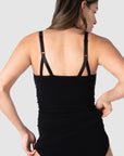 Rear view of the My Necessity Camisole by Hotmilk Lingerie UK in black. This camisole serves as the ideal base layer, featuring a long line design that covers a pregnant belly and offers postpartum comfort and support