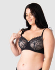 Olivia showcases the nursing clip functionality on Hotmilk UK award-winning Temptation in Black. Meticulously crafted for larger cup sizes, this bra provides a blend of style, support, and comfort throughout your breastfeeding journey