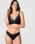 Mama of two, Kami delights in the support and uplift provided by Hotmilk's Warrior Plunge Black Flexiwire Maternity and Nursing Bra. Boasting a plunging neckline, edgy graphic lace over a half contour cup, it effortlessly blends the allure of style with the practicality of function. The modern touch of magnetic nursing clips completes this nursing bra, perfectly paired with the Warrior Brief. Embrace pregnancy and nursing on your terms—do it your way