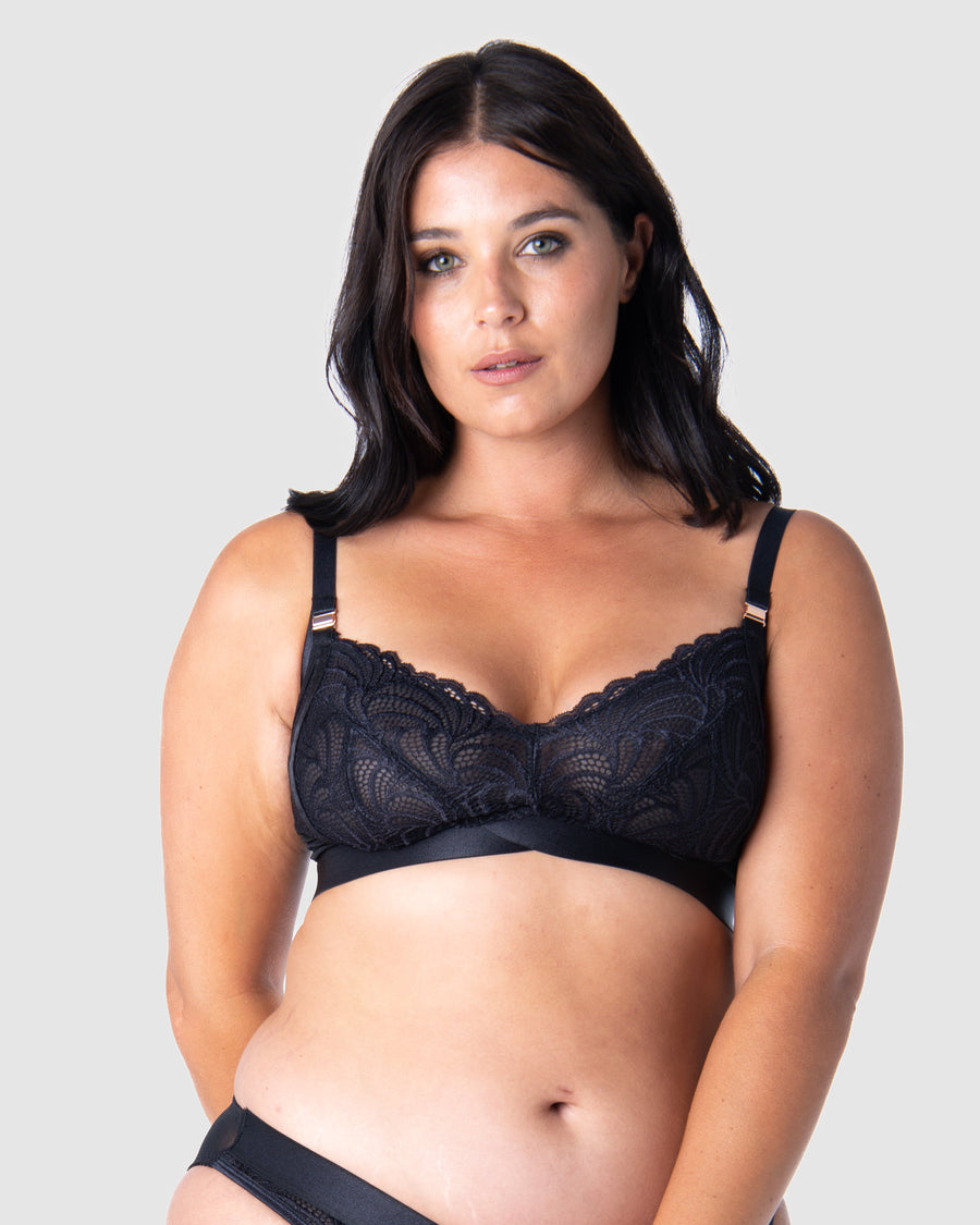 Experience the pinnacle of comfort and style as Olivia embraces the Warrior Soft Cup in Black by Hotmilk Lingerie. This wire-free maternity and nursing bra embodies a flawless fusion of lightness and youthfulness, boasting rose gold magnetic nursing clips and sheer graphic lace for a modern touch. Immerse yourself in the seamless blend of comfort and style, elevating this modern maternity essential to a must-have