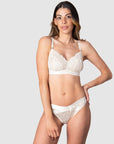 Teaming up with the Warrior Bikini Brief, Hotmilk's Warrior Soft Cup Nursing Bra seamlessly blends luxury, style, and comfort for your breastfeeding journey. Adorned with sheer lace and satin trim, this lush set is the perfect complement to enhance the radiance of a new mama like Kami. Frequently captured in stunning maternity shoots, this Hotmilk Lingerie UK ensemble promises to elevate and support you, making it an indispensable choice for both fashion and function